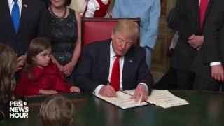 Trump signs first official documents as US president [upl. by Llerat]